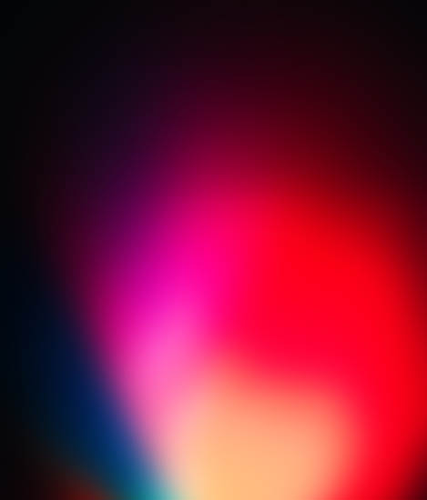 Blurry coloured light on a dark background