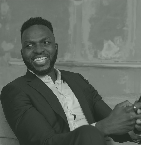 Sat man smiling
