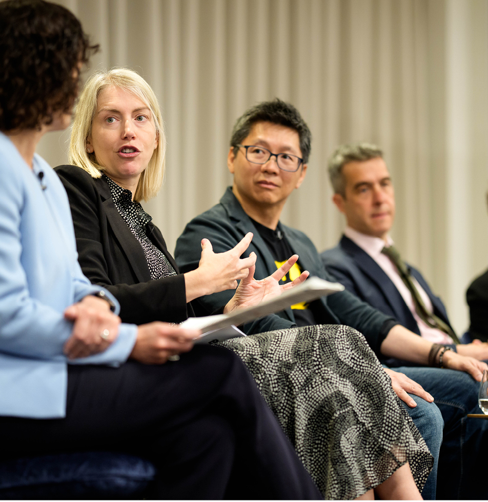 Speakers engaged in conversation