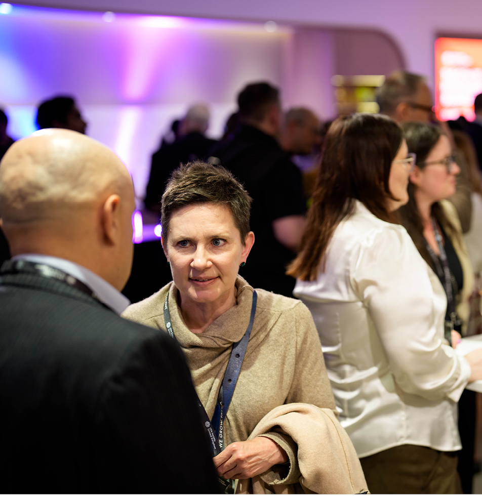 Two guests chatting during networking session