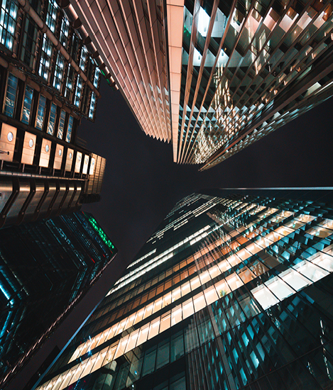 upwards view of London skyscraper at night